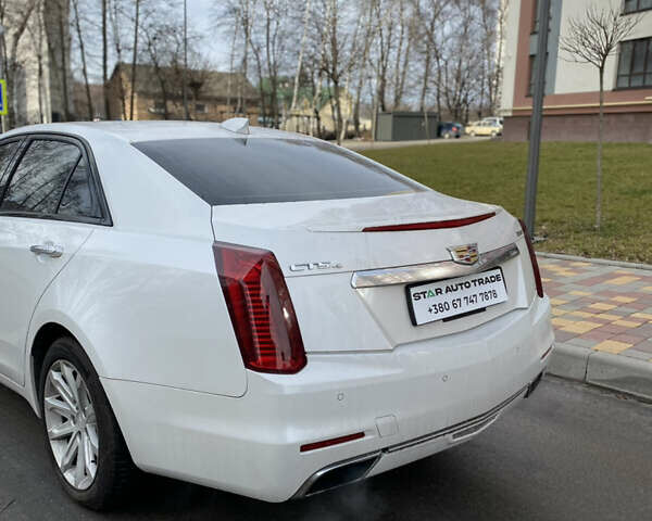 Белый Кадиллак СТС, объемом двигателя 2 л и пробегом 170 тыс. км за 13500 $, фото 4 на Automoto.ua