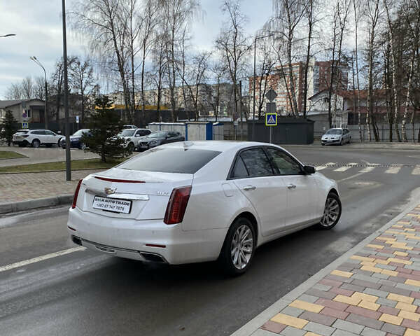 Белый Кадиллак СТС, объемом двигателя 2 л и пробегом 170 тыс. км за 13000 $, фото 1 на Automoto.ua