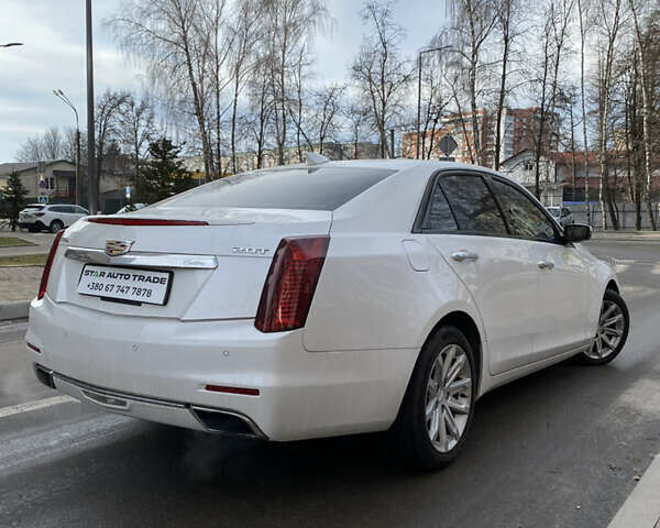 Белый Кадиллак СТС, объемом двигателя 2 л и пробегом 170 тыс. км за 13000 $, фото 6 на Automoto.ua