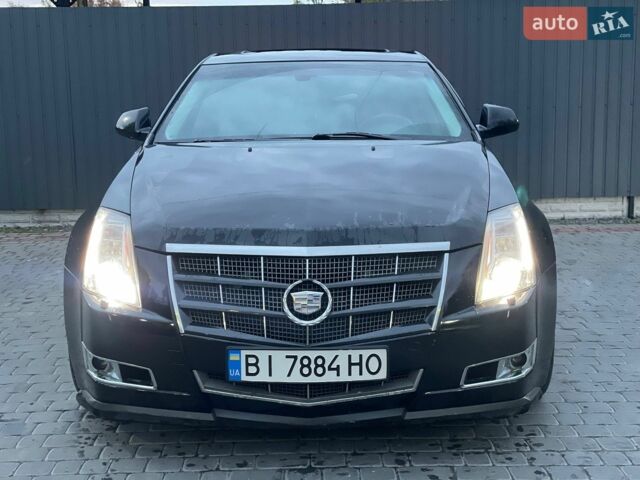 Черный Кадиллак СТС, объемом двигателя 3.6 л и пробегом 241 тыс. км за 9500 $, фото 2 на Automoto.ua