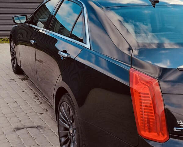 Черный Кадиллак СТС, объемом двигателя 2 л и пробегом 178 тыс. км за 12000 $, фото 2 на Automoto.ua