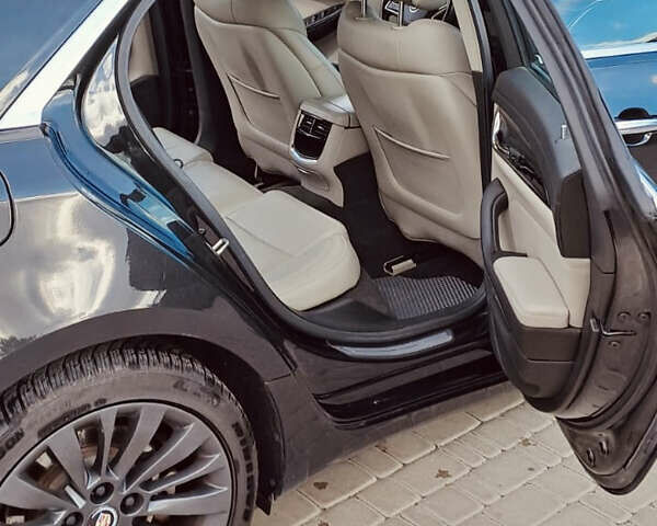 Черный Кадиллак СТС, объемом двигателя 2 л и пробегом 178 тыс. км за 12000 $, фото 3 на Automoto.ua