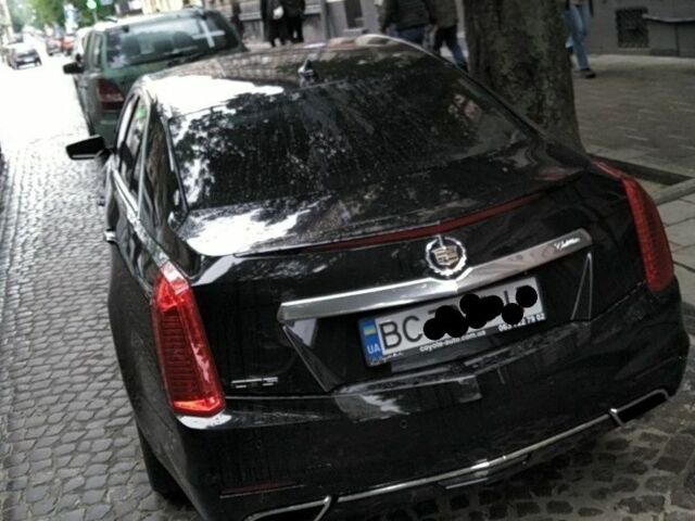 Чорний Каділак CTS, об'ємом двигуна 0 л та пробігом 172 тис. км за 13300 $, фото 5 на Automoto.ua