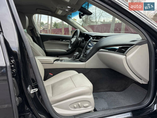 Черный Кадиллак СТС, объемом двигателя 2 л и пробегом 189 тыс. км за 9999 $, фото 19 на Automoto.ua