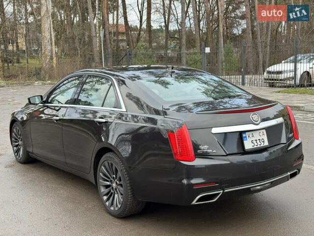 Черный Кадиллак СТС, объемом двигателя 2 л и пробегом 189 тыс. км за 9999 $, фото 6 на Automoto.ua