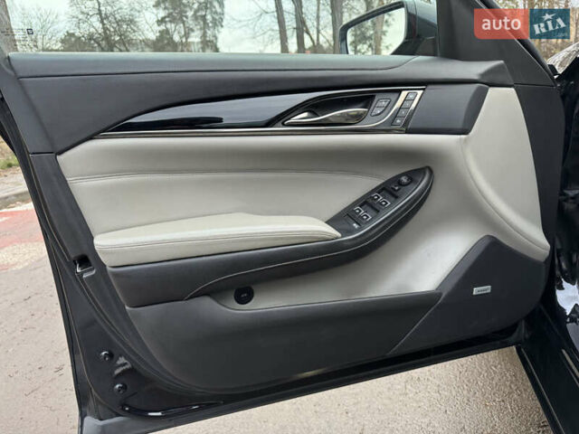 Черный Кадиллак СТС, объемом двигателя 2 л и пробегом 189 тыс. км за 9999 $, фото 18 на Automoto.ua