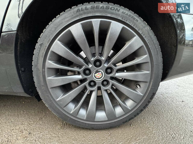 Черный Кадиллак СТС, объемом двигателя 2 л и пробегом 189 тыс. км за 9999 $, фото 25 на Automoto.ua