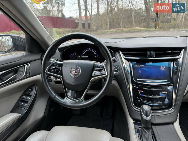 Черный Кадиллак СТС, объемом двигателя 2 л и пробегом 189 тыс. км за 9999 $, фото 14 на Automoto.ua