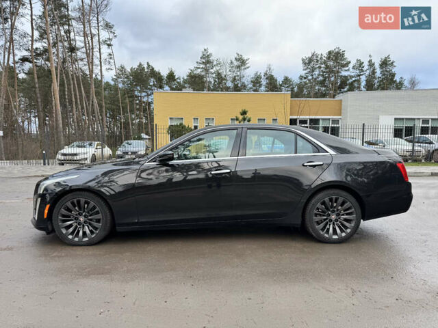 Черный Кадиллак СТС, объемом двигателя 2 л и пробегом 189 тыс. км за 9999 $, фото 4 на Automoto.ua