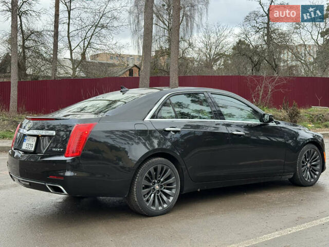 Черный Кадиллак СТС, объемом двигателя 2 л и пробегом 189 тыс. км за 9999 $, фото 9 на Automoto.ua