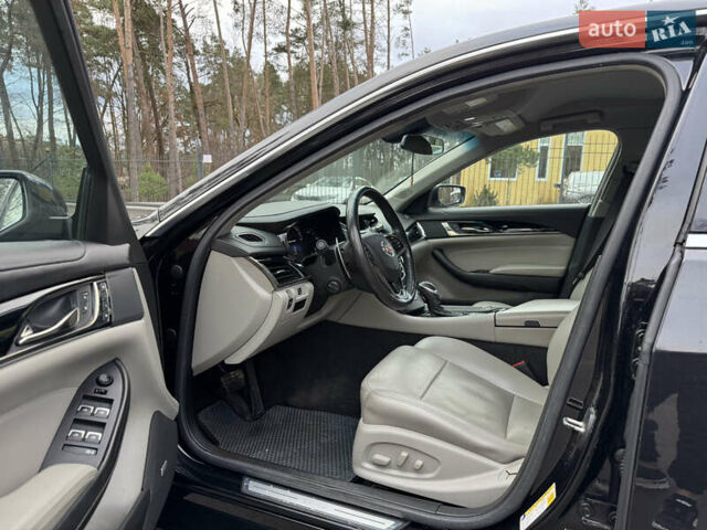 Черный Кадиллак СТС, объемом двигателя 2 л и пробегом 189 тыс. км за 9999 $, фото 16 на Automoto.ua