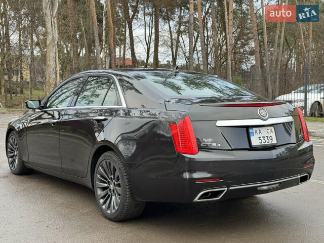 Черный Кадиллак СТС, объемом двигателя 2 л и пробегом 189 тыс. км за 9999 $, фото 5 на Automoto.ua