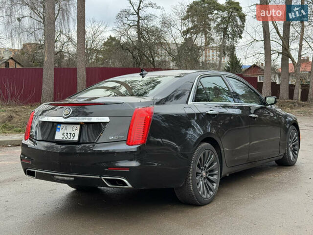 Черный Кадиллак СТС, объемом двигателя 2 л и пробегом 189 тыс. км за 9999 $, фото 8 на Automoto.ua