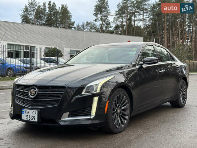 Черный Кадиллак СТС, объемом двигателя 2 л и пробегом 189 тыс. км за 9999 $, фото 1 на Automoto.ua