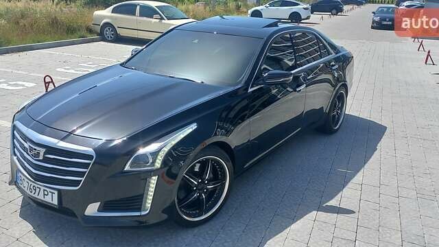 Чорний Каділак CTS, об'ємом двигуна 2 л та пробігом 140 тис. км за 15700 $, фото 16 на Automoto.ua