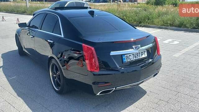 Чорний Каділак CTS, об'ємом двигуна 2 л та пробігом 140 тис. км за 15700 $, фото 19 на Automoto.ua