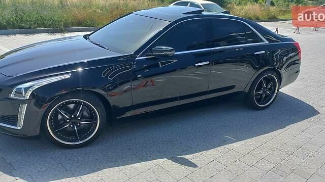 Чорний Каділак CTS, об'ємом двигуна 2 л та пробігом 140 тис. км за 15700 $, фото 21 на Automoto.ua