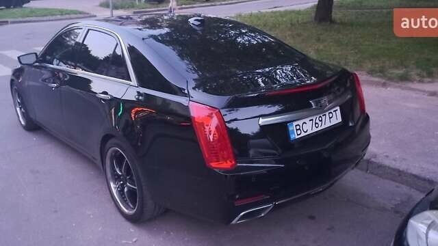Чорний Каділак CTS, об'ємом двигуна 2 л та пробігом 140 тис. км за 15700 $, фото 1 на Automoto.ua