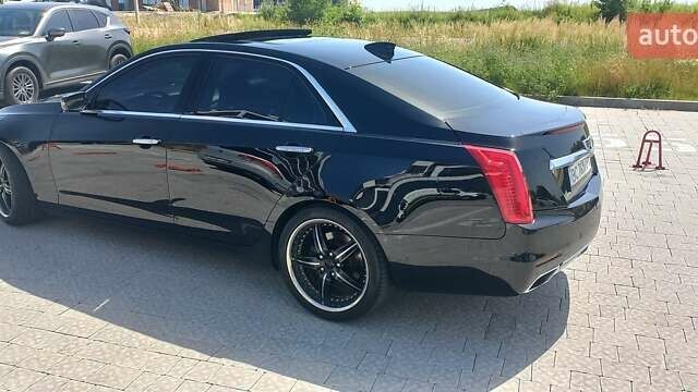 Чорний Каділак CTS, об'ємом двигуна 2 л та пробігом 140 тис. км за 15700 $, фото 20 на Automoto.ua