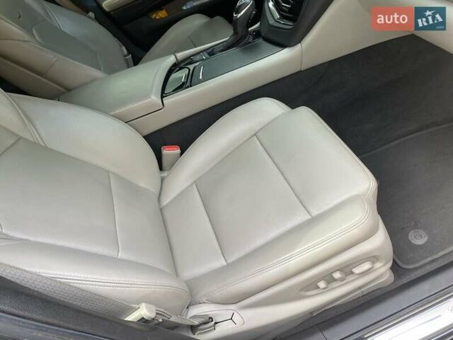 Черный Кадиллак СТС, объемом двигателя 2 л и пробегом 124 тыс. км за 11900 $, фото 16 на Automoto.ua