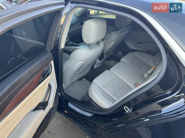 Черный Кадиллак СТС, объемом двигателя 2 л и пробегом 260 тыс. км за 10100 $, фото 6 на Automoto.ua