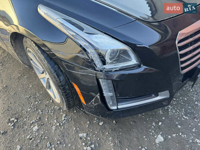 Черный Кадиллак СТС, объемом двигателя 2 л и пробегом 260 тыс. км за 10100 $, фото 2 на Automoto.ua