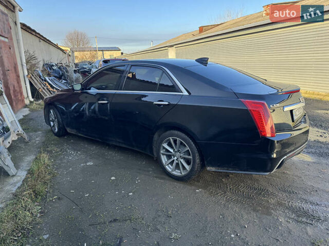 Черный Кадиллак СТС, объемом двигателя 2 л и пробегом 260 тыс. км за 10100 $, фото 4 на Automoto.ua