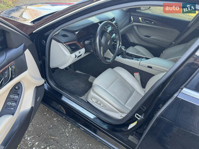 Черный Кадиллак СТС, объемом двигателя 2 л и пробегом 260 тыс. км за 10100 $, фото 5 на Automoto.ua