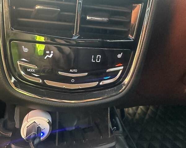 Сірий Каділак CTS, об'ємом двигуна 2 л та пробігом 114 тис. км за 14700 $, фото 38 на Automoto.ua