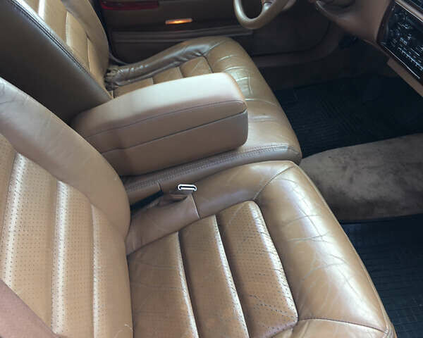 Белый Кадиллак ДеВиль, объемом двигателя 4.6 л и пробегом 176 тыс. км за 14500 $, фото 39 на Automoto.ua