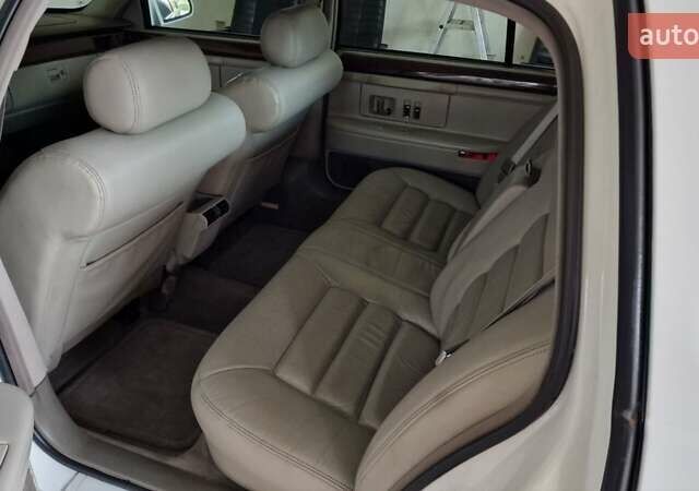 Белый Кадиллак ДеВиль, объемом двигателя 4.6 л и пробегом 92 тыс. км за 17000 $, фото 7 на Automoto.ua