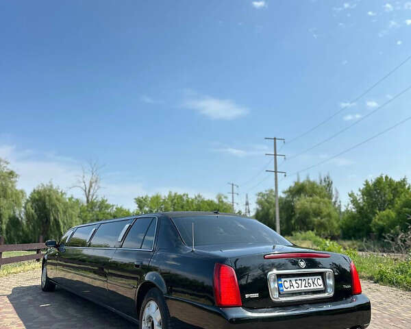 Черный Кадиллак ДеВиль, объемом двигателя 4.57 л и пробегом 150 тыс. км за 6555 $, фото 4 на Automoto.ua