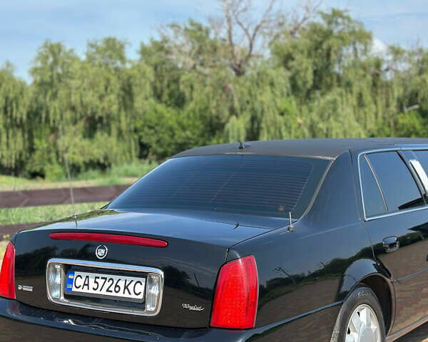 Черный Кадиллак ДеВиль, объемом двигателя 4.57 л и пробегом 150 тыс. км за 6555 $, фото 20 на Automoto.ua