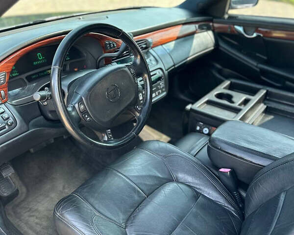 Черный Кадиллак ДеВиль, объемом двигателя 4.57 л и пробегом 150 тыс. км за 6555 $, фото 10 на Automoto.ua