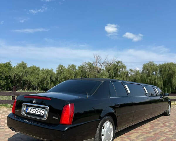 Черный Кадиллак ДеВиль, объемом двигателя 4.57 л и пробегом 150 тыс. км за 6555 $, фото 1 на Automoto.ua
