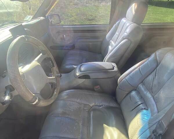 Черный Кадиллак Эскалейд, объемом двигателя 5.8 л и пробегом 300 тыс. км за 6600 $, фото 7 на Automoto.ua