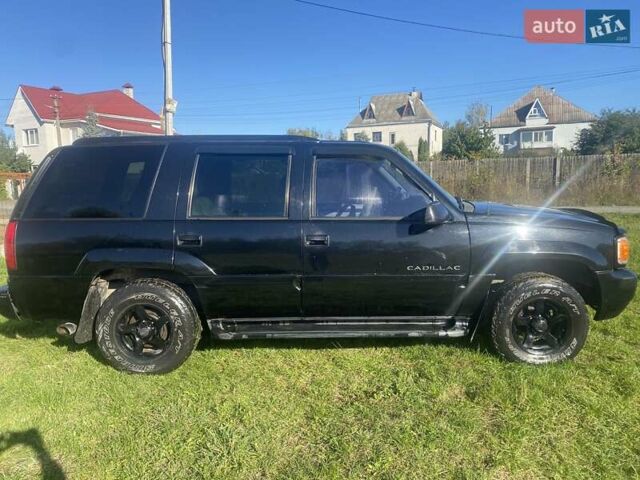 Черный Кадиллак Эскалейд, объемом двигателя 5.8 л и пробегом 300 тыс. км за 6600 $, фото 2 на Automoto.ua