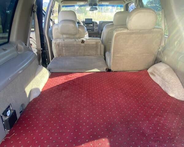 Черный Кадиллак Эскалейд, объемом двигателя 5.8 л и пробегом 300 тыс. км за 6600 $, фото 11 на Automoto.ua