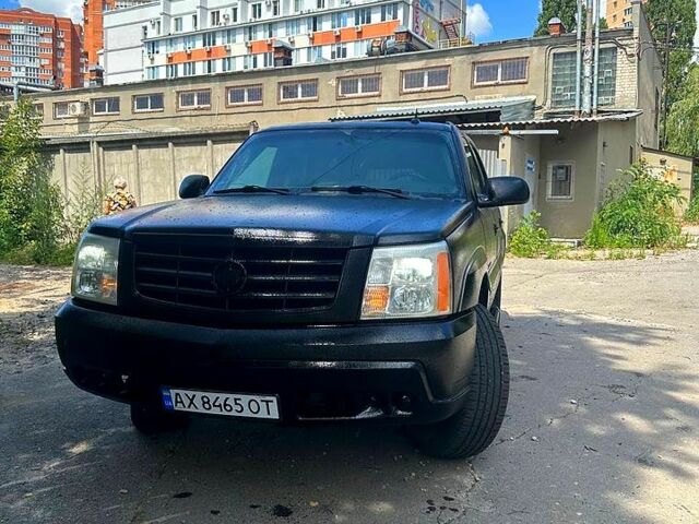 Черный Кадиллак Эскалейд, объемом двигателя 6 л и пробегом 100 тыс. км за 13200 $, фото 2 на Automoto.ua