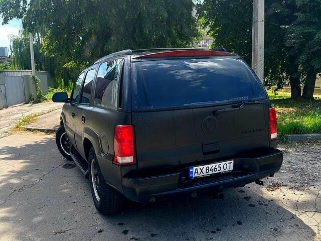 Черный Кадиллак Эскалейд, объемом двигателя 6 л и пробегом 100 тыс. км за 13200 $, фото 3 на Automoto.ua