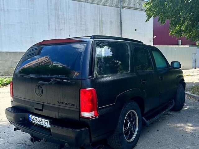 Черный Кадиллак Эскалейд, объемом двигателя 6 л и пробегом 100 тыс. км за 13200 $, фото 4 на Automoto.ua