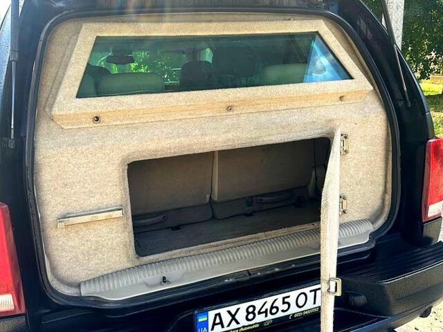 Черный Кадиллак Эскалейд, объемом двигателя 6 л и пробегом 100 тыс. км за 13200 $, фото 5 на Automoto.ua