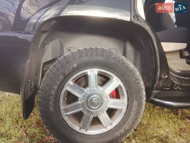 Черный Кадиллак Эскалейд, объемом двигателя 6.2 л и пробегом 230 тыс. км за 8900 $, фото 1 на Automoto.ua