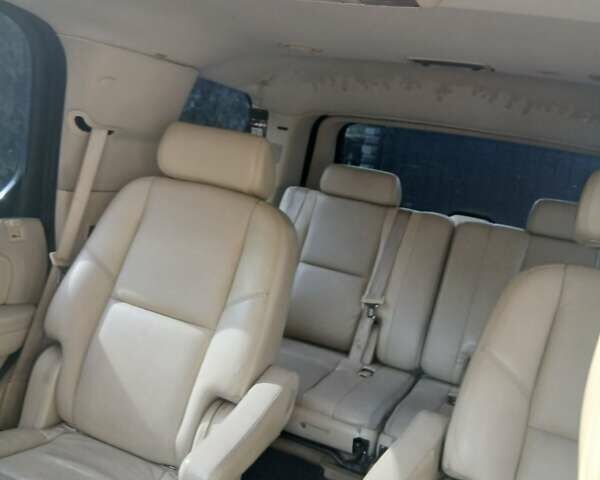 Чорний Каділак Ескалейд, об'ємом двигуна 6.2 л та пробігом 115 тис. км за 12500 $, фото 1 на Automoto.ua