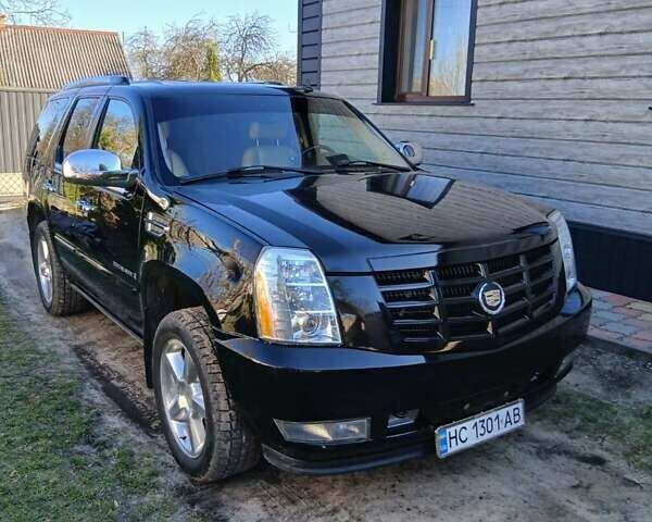 Чорний Каділак Ескалейд, об'ємом двигуна 6.2 л та пробігом 115 тис. км за 12500 $, фото 9 на Automoto.ua