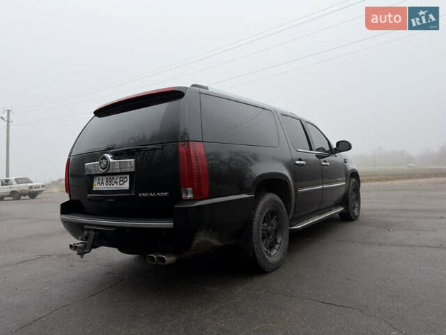 Чорний Каділак Ескалейд, об'ємом двигуна 6.2 л та пробігом 250 тис. км за 14000 $, фото 17 на Automoto.ua