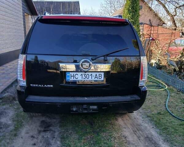 Чорний Каділак Ескалейд, об'ємом двигуна 6.2 л та пробігом 115 тис. км за 12500 $, фото 11 на Automoto.ua