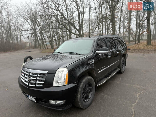 Чорний Каділак Ескалейд, об'ємом двигуна 6.2 л та пробігом 250 тис. км за 14000 $, фото 10 на Automoto.ua