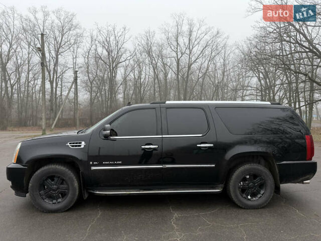 Чорний Каділак Ескалейд, об'ємом двигуна 6.2 л та пробігом 250 тис. км за 14000 $, фото 9 на Automoto.ua