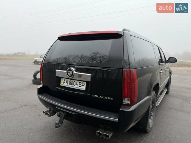 Чорний Каділак Ескалейд, об'ємом двигуна 6.2 л та пробігом 250 тис. км за 14000 $, фото 12 на Automoto.ua